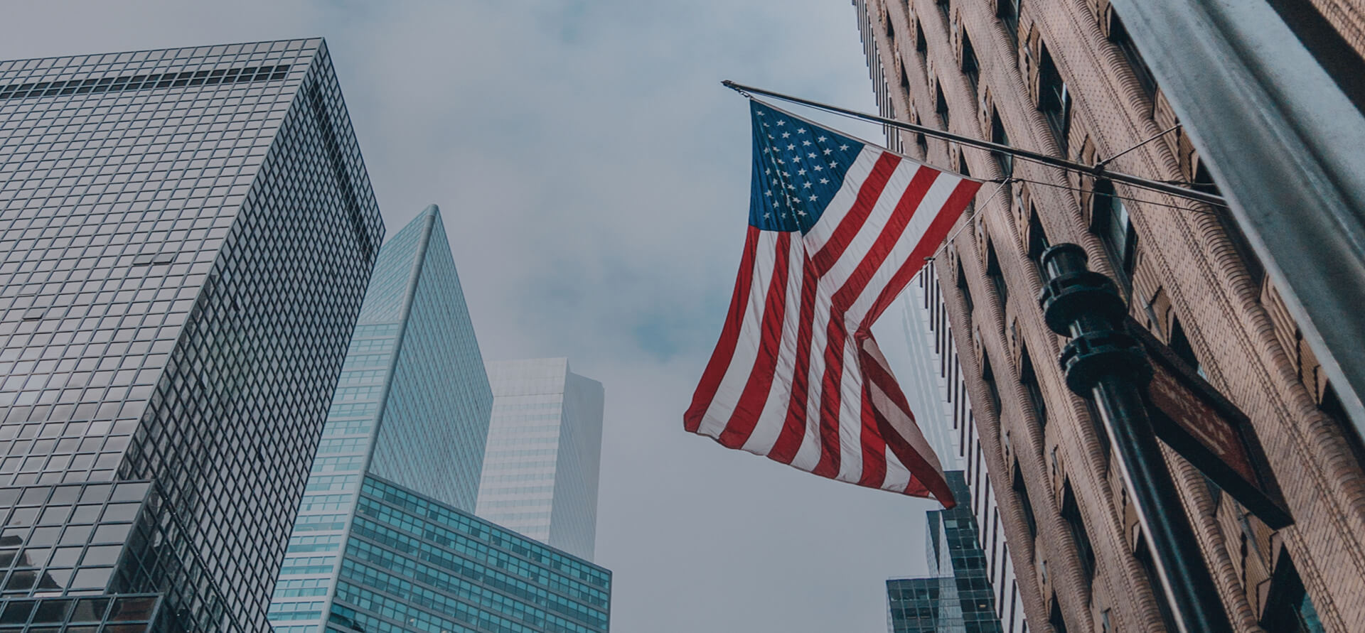 USA flag and buildings